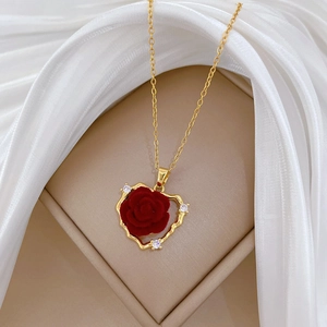 Luxurious gold stainless steel heart necklace with red flocked rose and sparkling crystals