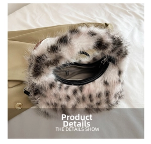 Internal view of plush leopard print crescent bag showing black lining and zip closure