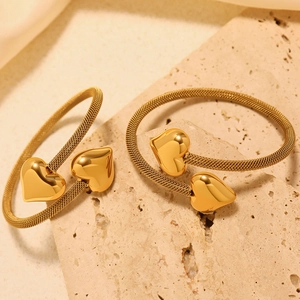 18K gold plated mesh bangle featuring a 3D double heart open design on natural stone