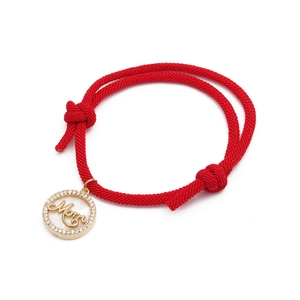 Adjustable red braided rope bracelet with gold MOM pendant and micro-pave crystals