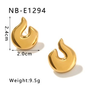 Detail view of gold flame earrings with measurements 2.4cm by 2.0cm and weight 9.5g