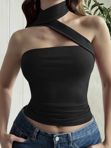 Close-up detail of a stylish black Y2K halter neck tube top with unique shoulder cutouts