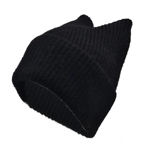 Detailed close-up of black cat ear knit beanie featuring thick vertical ribbed texture