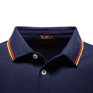 Men's navy polo shirt with striped collar detail and classic pique cotton texture