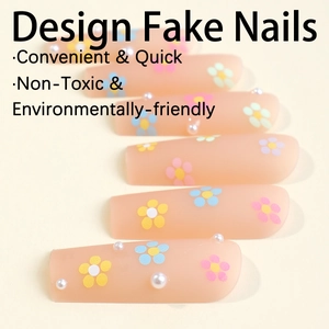 Extra long ballerina press-on nails with floral patterns and 3D pearls on matte pink base