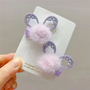 Detail of purple faux mink hair bow clips with sequin rabbit ears for girls