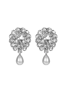 Detail of luxury teardrop pearl earrings with sparkling crystal floral clusters