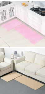 Detail of pink and beige chenille bath mats showing soft textured absorbent fabric