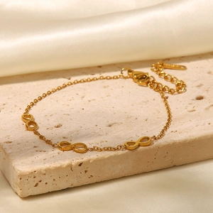 Gold-plated stainless steel chain bracelet with infinity charms and lobster clasp