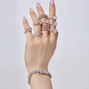 Detailed view of luxury S925 sterling silver heart-shaped zircon rings and tennis bracelet