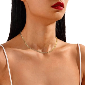 Elegant gold-plated stainless steel star necklace worn by model on white background