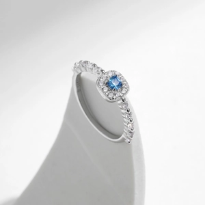Luxurious S925 sterling silver ring with square blue crystal and halo diamond setting
