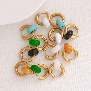 Gold round hoop earrings with colorful turquoise and marble stone beads set on white
