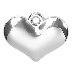 Macro detail of high-polish heart pendant with a smooth mirror-like silver finish