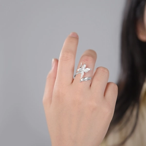 Elegant S925 silver iris flower adjustable ring with textured metal petals for women