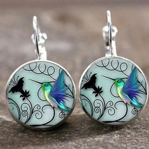 French leverback earrings featuring colorful hummingbird patterns on glass cabochons
