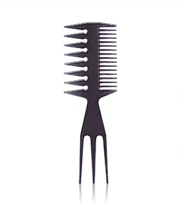 Macro detail of purple hair comb featuring wide teeth and a triple fork tail tip