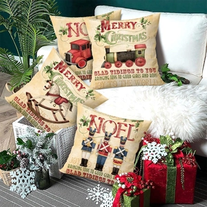 Set of 4 vintage Christmas pillow covers with nutcracker and red truck on white sofa