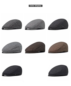 Detailed view of striped herringbone newsboy caps in various colors and textures