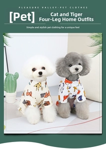 Detail of dog pajamas with cute giraffe and colorful cat prints in soft knitted cotton