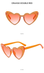 Detail of orange heart sunglasses with rhinestones and glitter gradient lenses