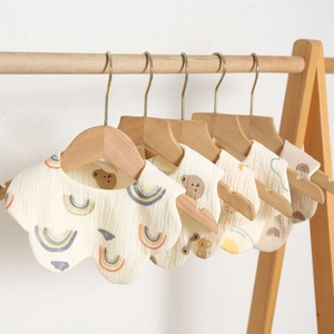Five-pack of 360-degree rotating muslin cotton baby bibs with cute cartoon patterns