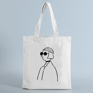 White canvas tote bag featuring a black line art girl portrait in minimalist fashion style