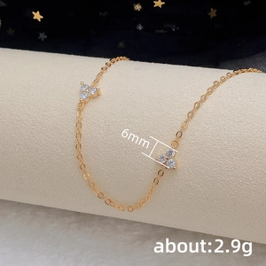 Minimalist gold necklace choker with three-petal zircon flower pendants weighing 2.9g