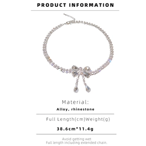 Detail showing product information and size of rhinestone bowknot necklace in silver