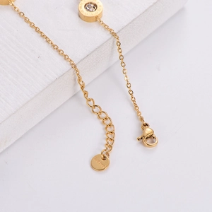 Gold stainless steel Roman numeral bracelet with crystal pendant and adjustable chain