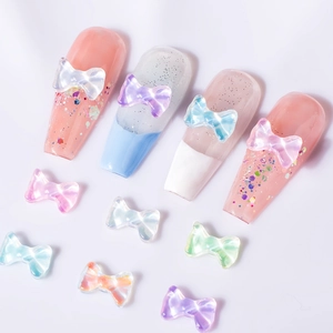 3D aurora bow nail art charms with colorful iridescent finish for DIY manicure decor