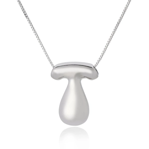 Macro detail of silver minimalist initial pendant with polished finish and delicate chain