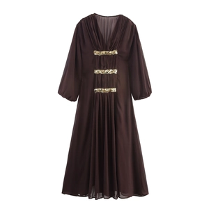 Elegant deep brown V-neck maxi dress with golden sequin bands and pleated details