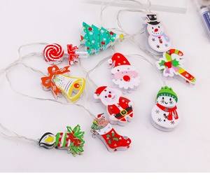 Detail of multi-shape Christmas LED clip lights with Santa, Snowman and Tree designs