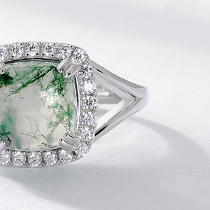 Elegant S925 silver ring featuring a sugarloaf moss agate stone and zircon halo