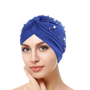 Royal blue pleated turban hat for women with elegant white pearls and silver metal beads