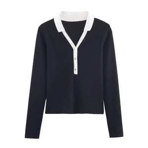 Knitted polo top with contrast collar, ribbed texture and gold buttons on white background