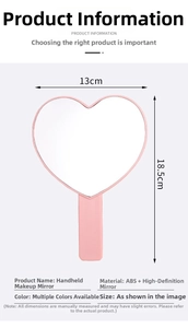Pink heart-shaped handheld makeup mirror with ergonomic handle and 13cm wide lens