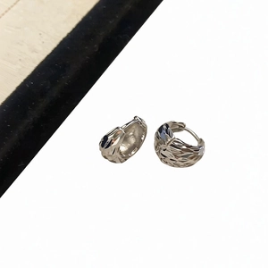Minimalist silver U-shaped hoop earrings with geometric engraved texture for daily wear