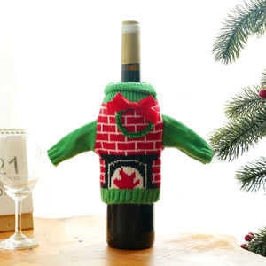 Christmas knit wine bottle sweater with red bow and mini wreath holiday decor