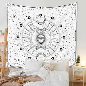 Detailed astrology wall tapestry with celestial sun moon and zodiac symbols in a cozy bedroom