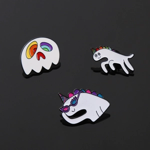 Unicorn and ghost enamel pin set with rainbow details for bags and clothing accessories