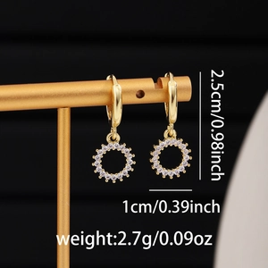 Detail showing dimensions of gold hollow circle earrings with white cubic zirconia inlay