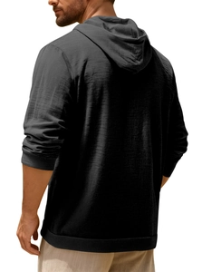 Back view of a black cotton linen hooded shirt featuring long sleeves and textured fabric
