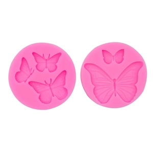 Pink silicone butterfly molds for fondant cake decorating and craft resin clay