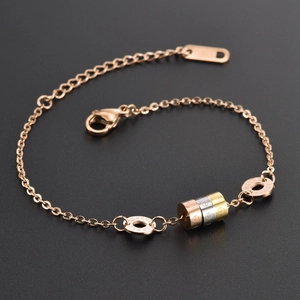 Three-tone titanium steel bracelet with rose gold beads and Roman numeral rings