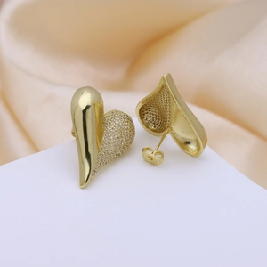 18k gold plated heart earrings featuring pavé cubic zirconia on a white display stand