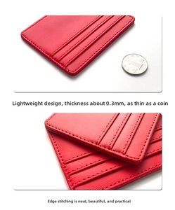 Macro shot of ultra-thin 0.3mm red PU leather card holder with precise edge stitching