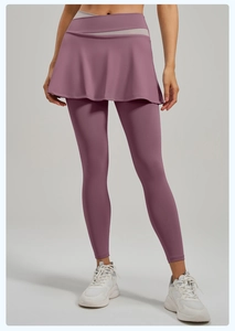 Detail of cross-over high waist on two-piece yoga leggings in smoky pink finish