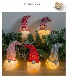 Macro view of glowing knit forest gnome ornaments with warm LED light and snowflake patterns